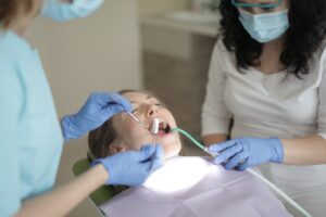 Young girl having dental procedure